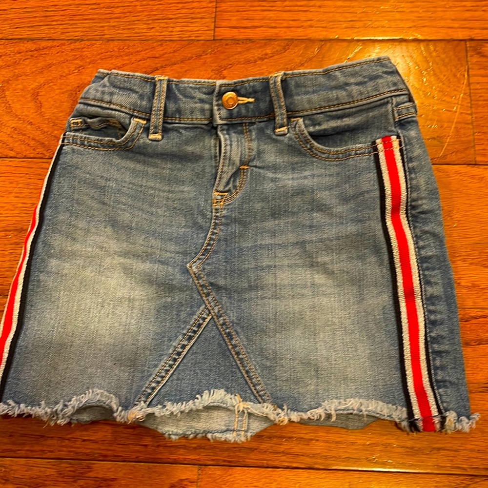 Denim Skirt with navy blue, red, and silver stripes.